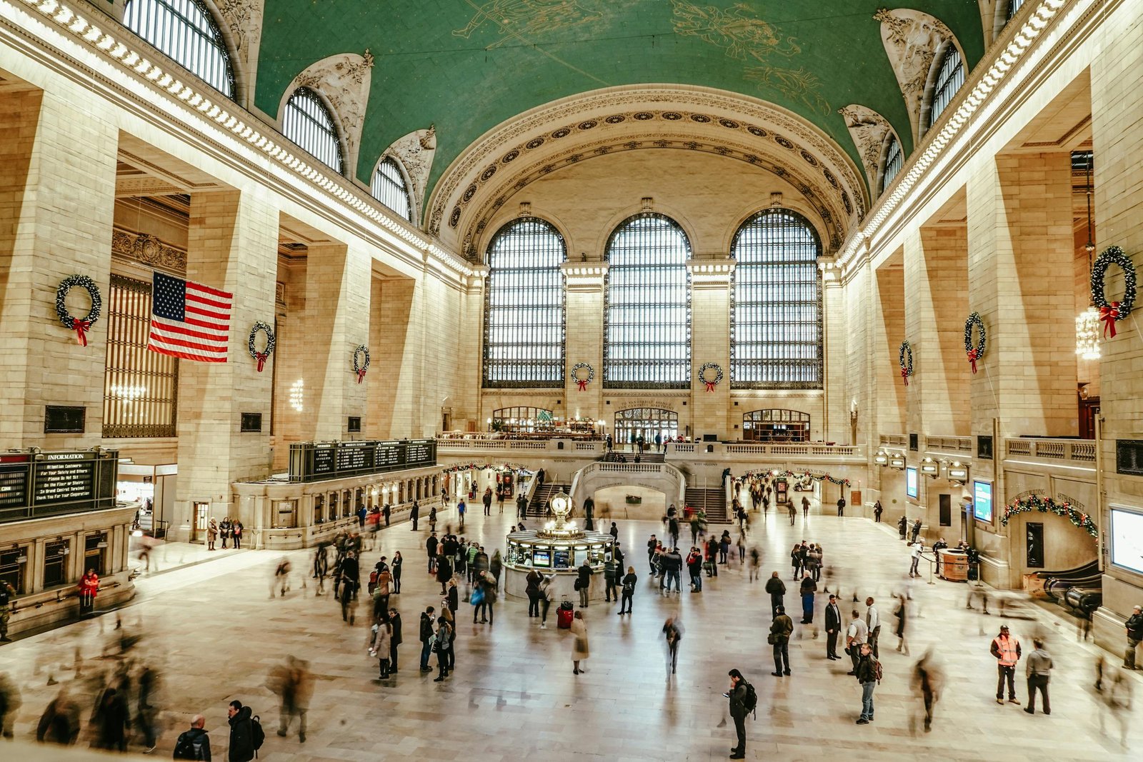 Bustling interior view of Grand Central Terminal with commuters and iconic architecture. Using the train is a great way to get here for your 3 days in New York City